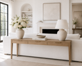 Load image into Gallery viewer, console table that is behind a sofa with flowers in a vase and a table lamp on it
