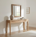 Load image into Gallery viewer, console table with a vase and books on it and a mirror above it hanginig on the wall
