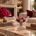 Load image into Gallery viewer, A crystal bowl filled with decorative pom-pom balls sits on a polished marble coffee table in a warm, upscale living room. A vase of deep pink flowers, books, a candle, and a sofa with magenta pillows are visible in the background near a fireplace.
