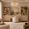 Load image into Gallery viewer, A beautifully styled home office featuring a light beige wood writing desk flanked by matching shelving units, a cream boucle office chair, a tiered crystal chandelier, and tasteful decor.
