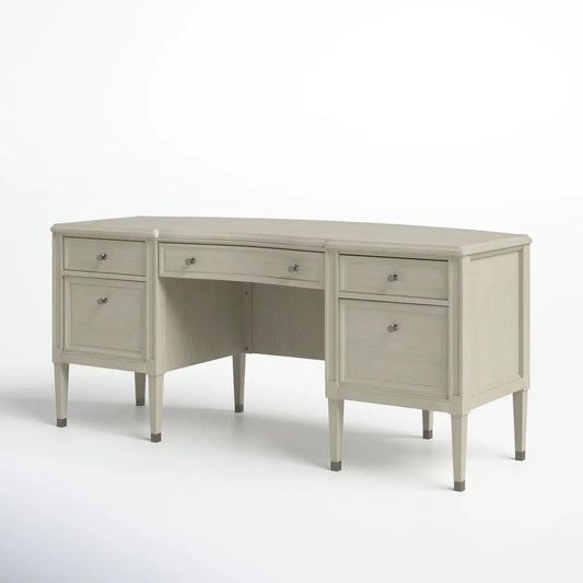 Beige solid wood executive desk with champagne finish, featuring multiple drawers and tapered legs on white background