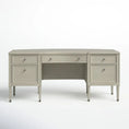 Load image into Gallery viewer, Beige solid wood executive desk with five drawers, tapered legs, and champagne finish on white background
