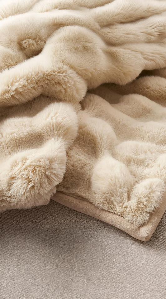 faux chinchilla throw bunched together