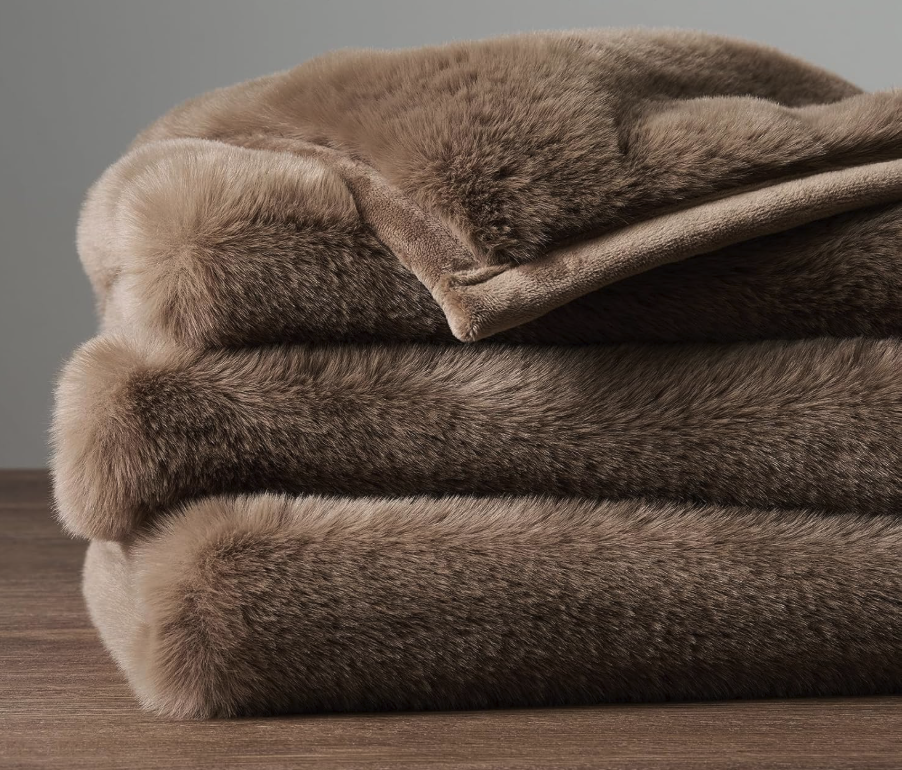 Faux Chinchilla Throw mocha colored folded on table