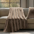 Load image into Gallery viewer, Evergrace Faux Fur Throw folded over on sofa in living room

