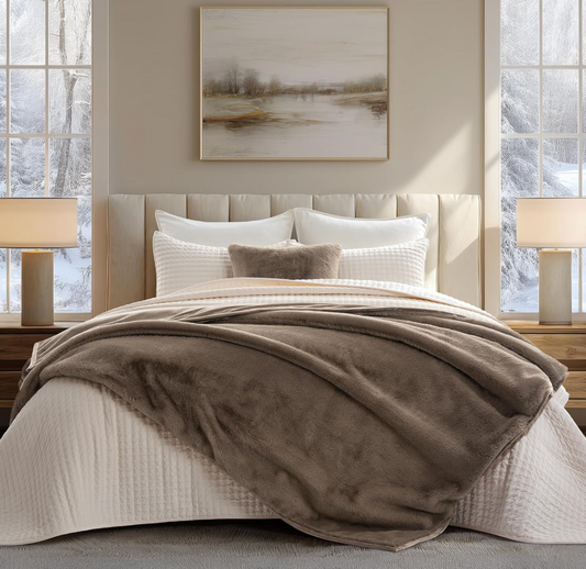 Faux Chinchilla Throw draped across bed in bedroom