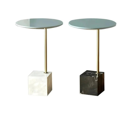 Two sleek and sophisticated MODERN SIDE TABLEs by House of Effy with gold stems. One has a white marble square base, and the other has a black marble square base, perfect for adding a touch of contemporary design to any room.