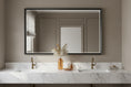 Load image into Gallery viewer, framed mirror in bathroom above sink
