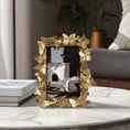 Load image into Gallery viewer, gold picture frame on table in living room
