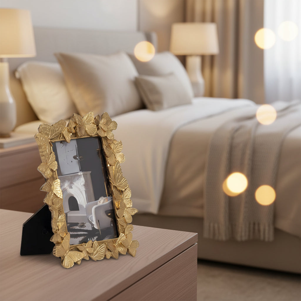gold picture frame side view in a bedroom on a table