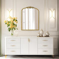 Load image into Gallery viewer, gold wall mirror in bedroom on wall

