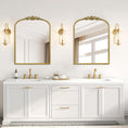 Load image into Gallery viewer, gold wall mirror above each sink in bathroom
