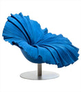 Load image into Gallery viewer, A blue modern FLOWER CHAIR designed by House of Effy to resemble fluttering fabric, mounted on a central metallic pedestal against a neutral background.
