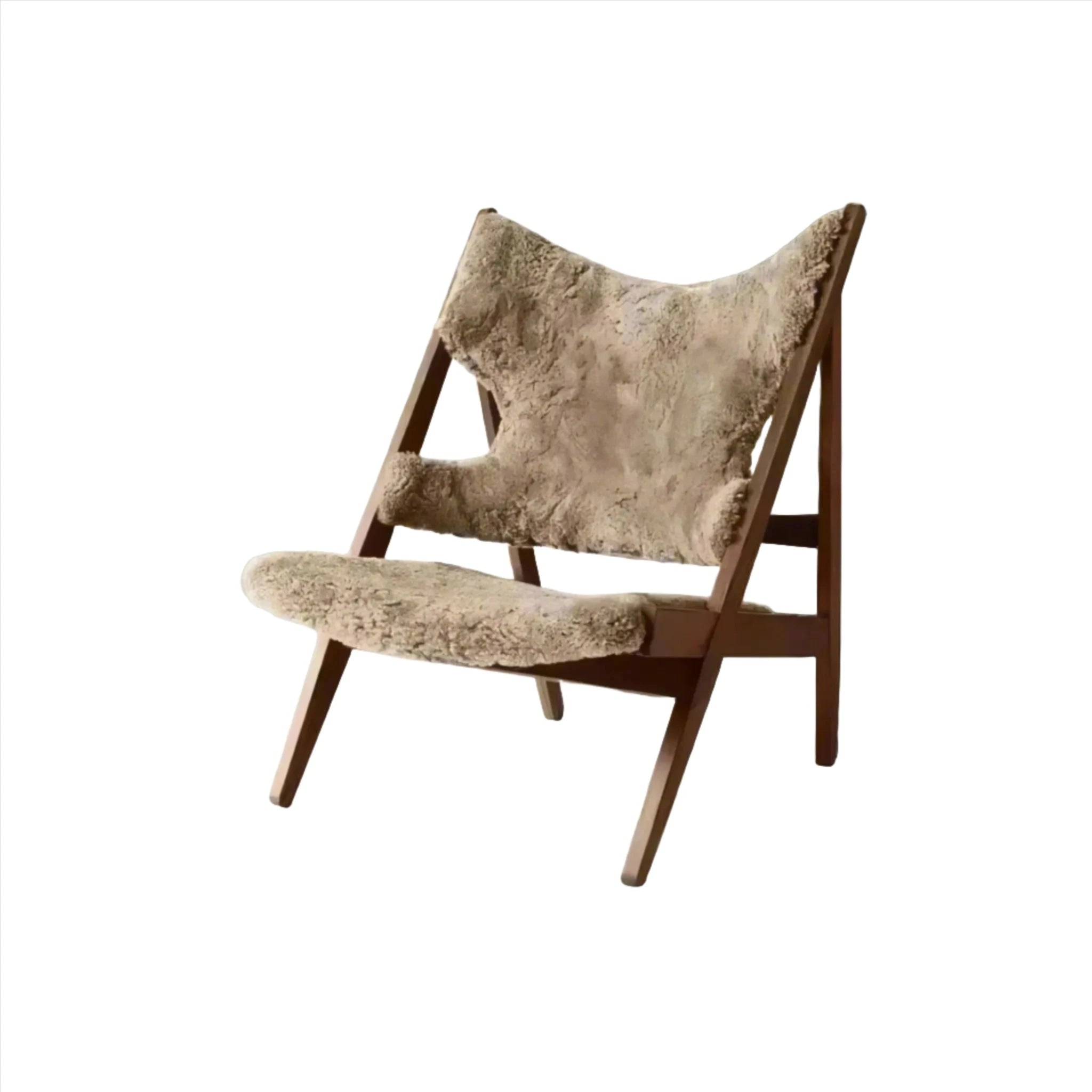 A House of Effy MINIMALIST CHAIR with a light brown, plush seat and backrest, boasting a sleek, contemporary design.