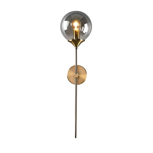 House of Effy's contemporary wall sconce, the "Reflection Brass Wall Sconce," features a brass finish with a round, reflective backplate and a single exposed bulb.