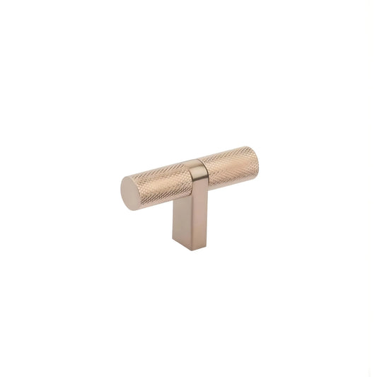 Polished nickel knurled T-knob cabinet pull with textured cylindrical grip on a simple square stem against white background