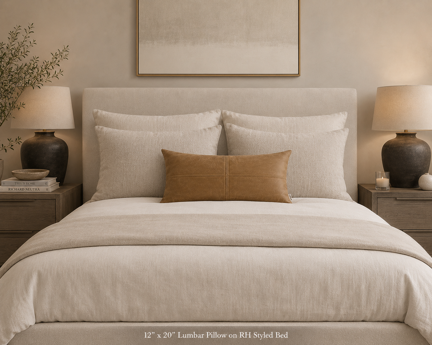 faux leather pillow in a room on top of a bed between 2 nightstands