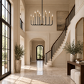 Load image into Gallery viewer, Lincoln black and gold 12-light chandelier in a double-height foyer
