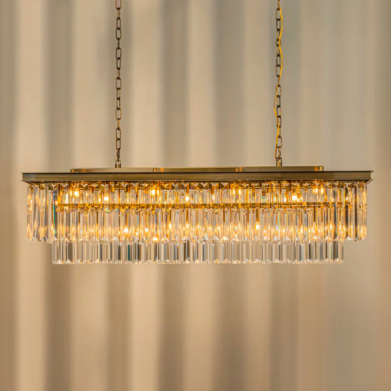 linear crystal chandelier hanging from ceiling in a room