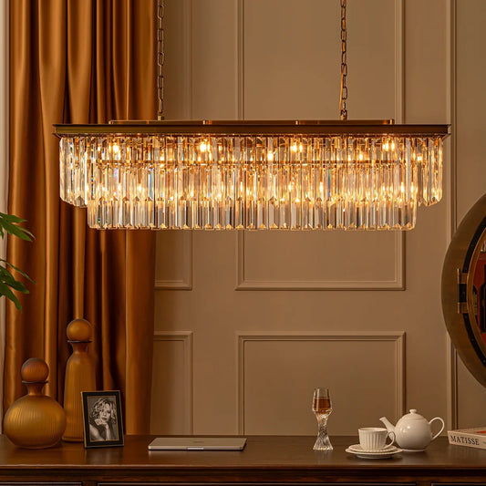 linear crystal chandelier in formal room with table underneath