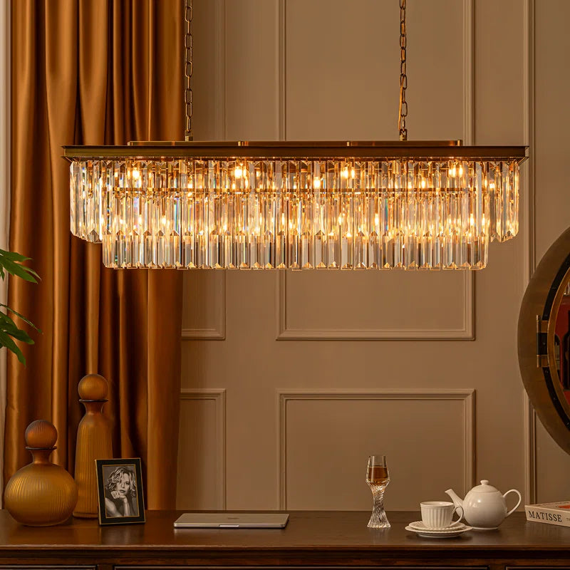 linear crystal chandelier in room above a table