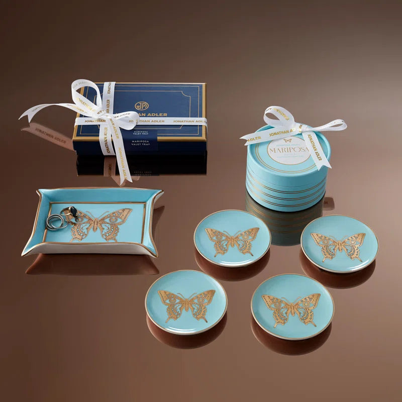 mariposa tray with it's packaging on brown table
