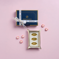 Load image into Gallery viewer, Muse Valet Tray overhead view of it on a pink table with candies next to it and it's box it gets packaged in
