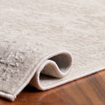 Load image into Gallery viewer, oriental rug folded over on hardwood floor

