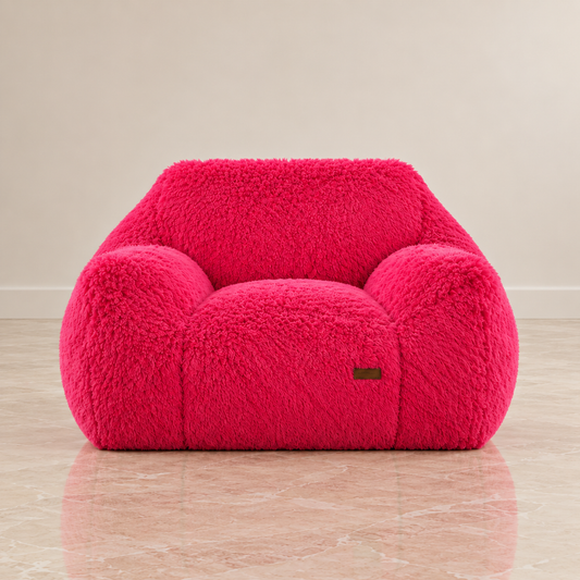 pink puff floor chair in studio space