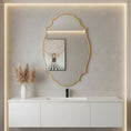Load image into Gallery viewer, scalloped mirror above sink in bathroom
