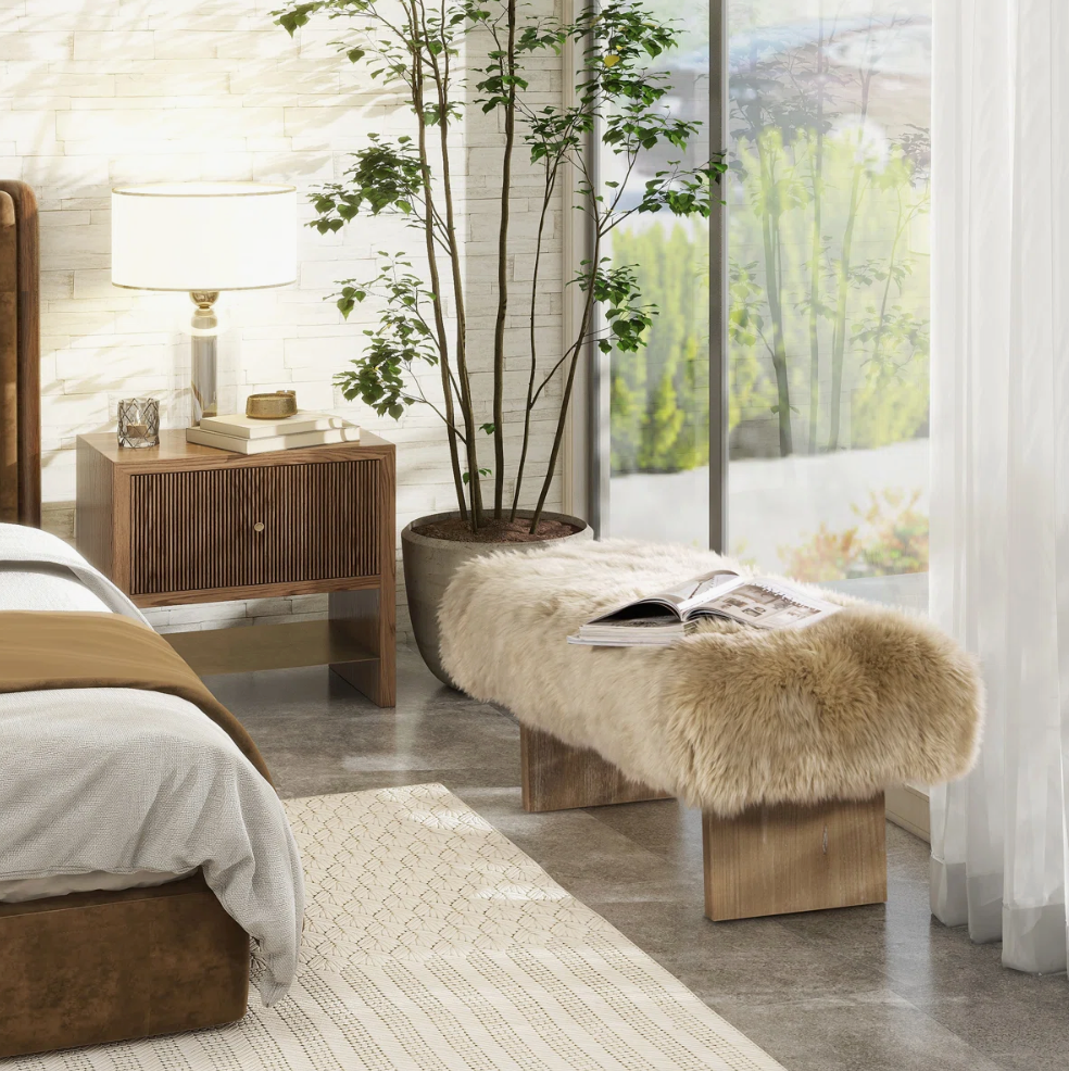 Sheepskin Bench in bedroom by window and across from bed