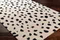 Load image into Gallery viewer, Poulos Area Rug angled view on top of hardwood flooring
