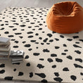 Load image into Gallery viewer, sofia runner rug on top of hardwood flooring with a bean bag chair on it and some books
