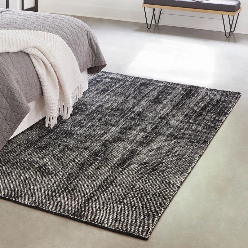 the emery runner rug in front of bed in bedroom