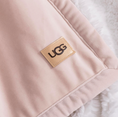 Load image into Gallery viewer, ugg pink throw close-up with tag
