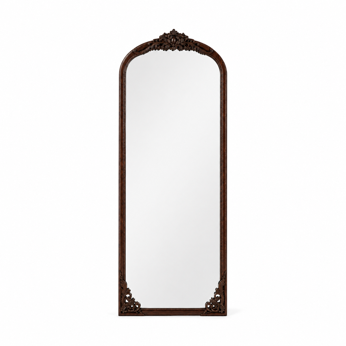 wall mirror with an ornate dark brown carved wooden frame, shown against a plain white background.
