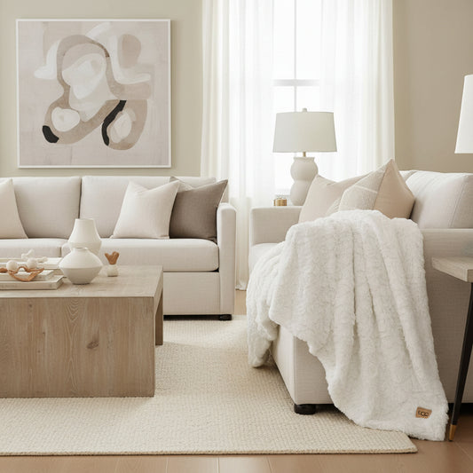 white ugg blanket on sofa arm in living room