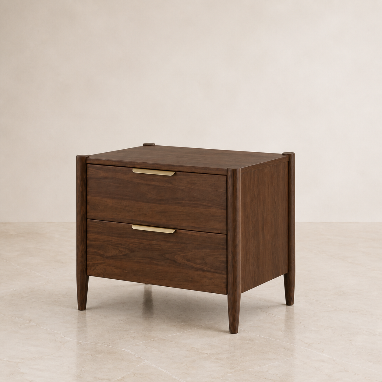 A mid-century modern two-drawer nightstand in dark walnut wood with brass handles, set against a neutral beige wall and floor.
