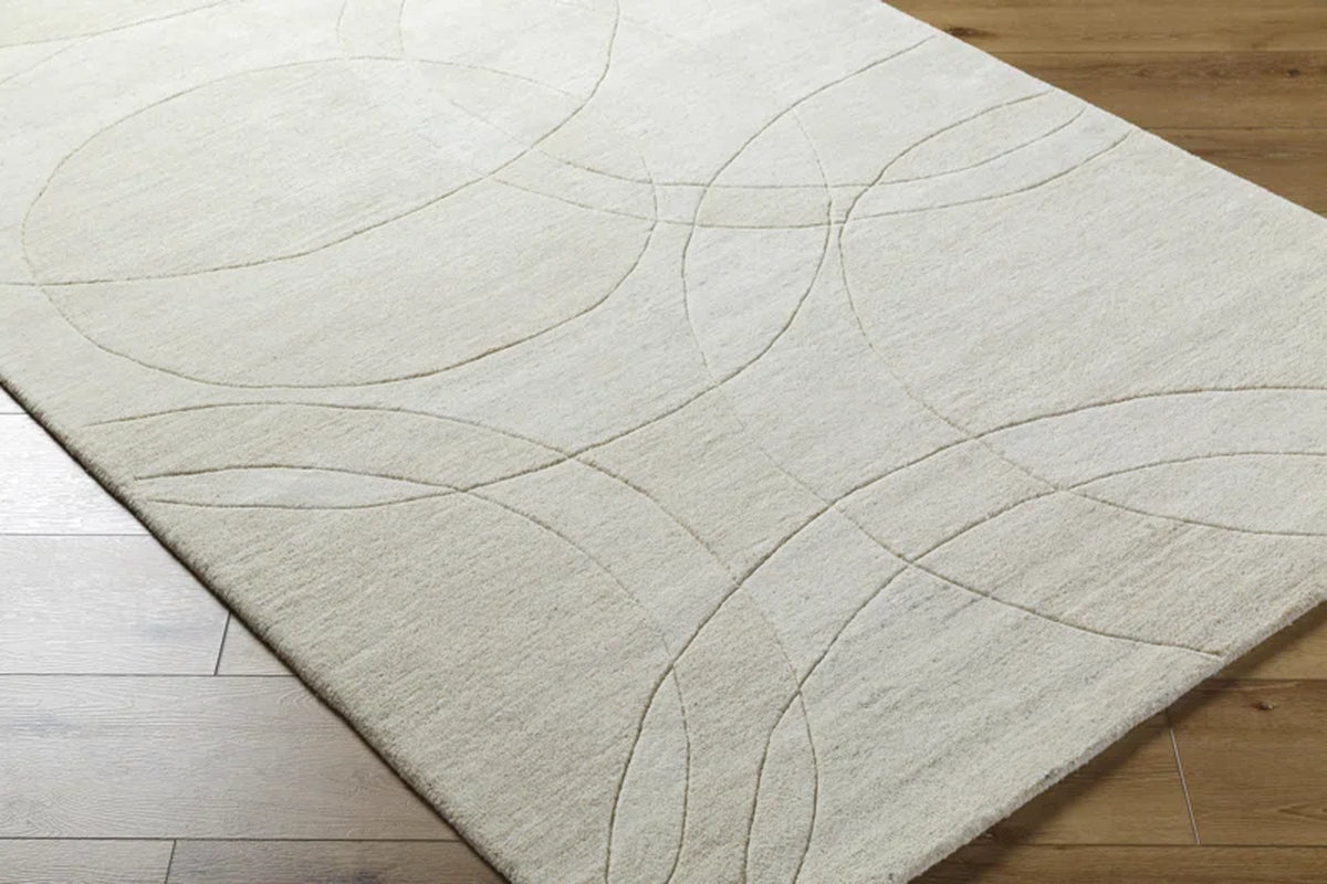 Woven Rug on hardwood floor