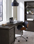 Load image into Gallery viewer, writing desk in at-home office with a computer on it and shelving next to it
